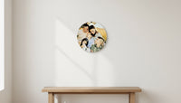 Memory Wood round plaque wall-mounted above a bench